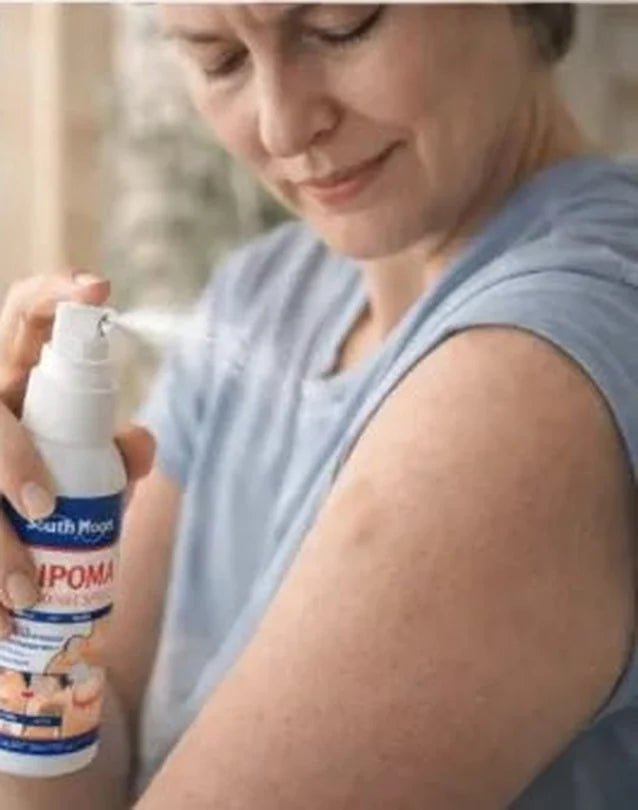 Persona aplicando SinLipomas sobre el brazo como parte de su rutina localizada